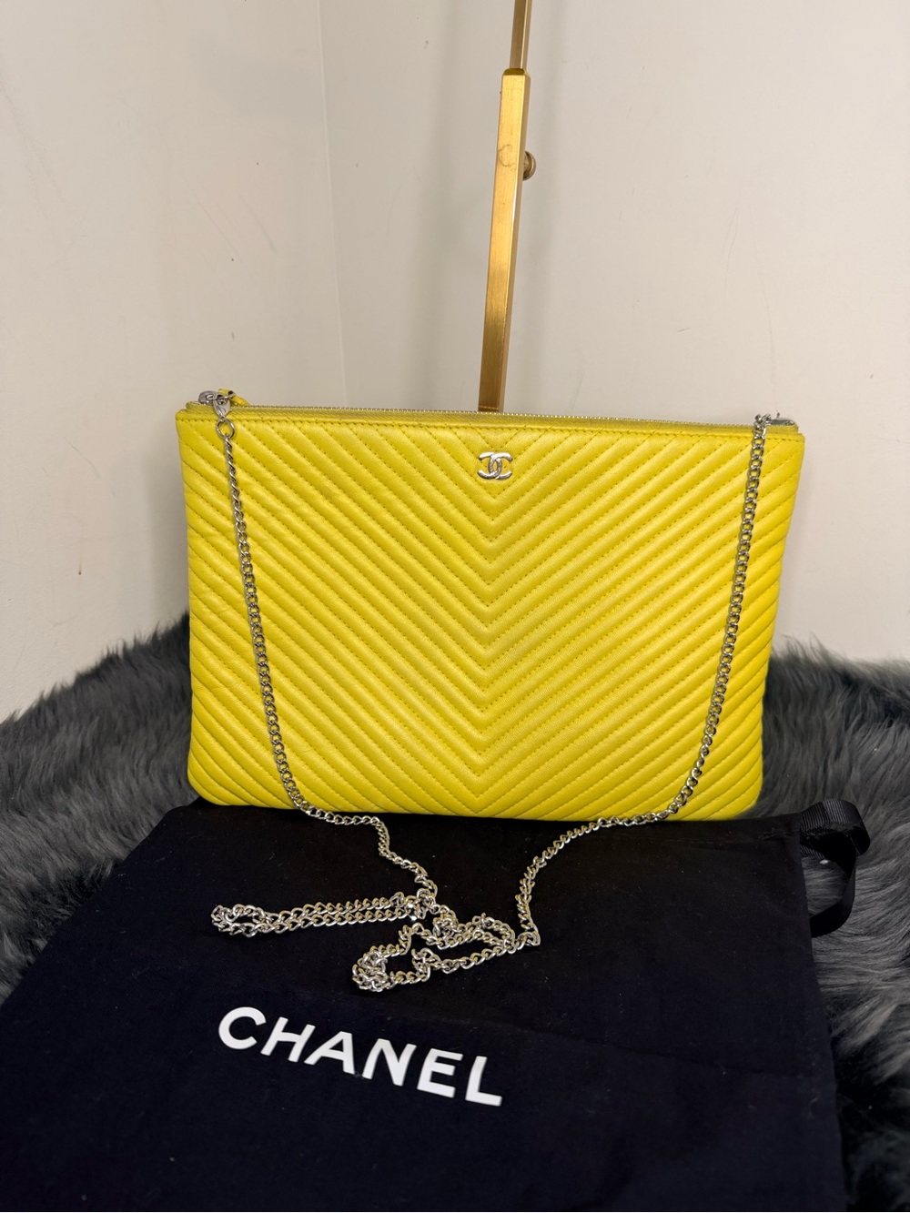 CHANEL Yellow Chevron lambskin clutch with provided chain